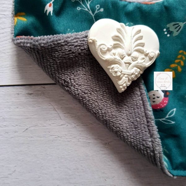détail bavoir renard émeraude rose et reves dores