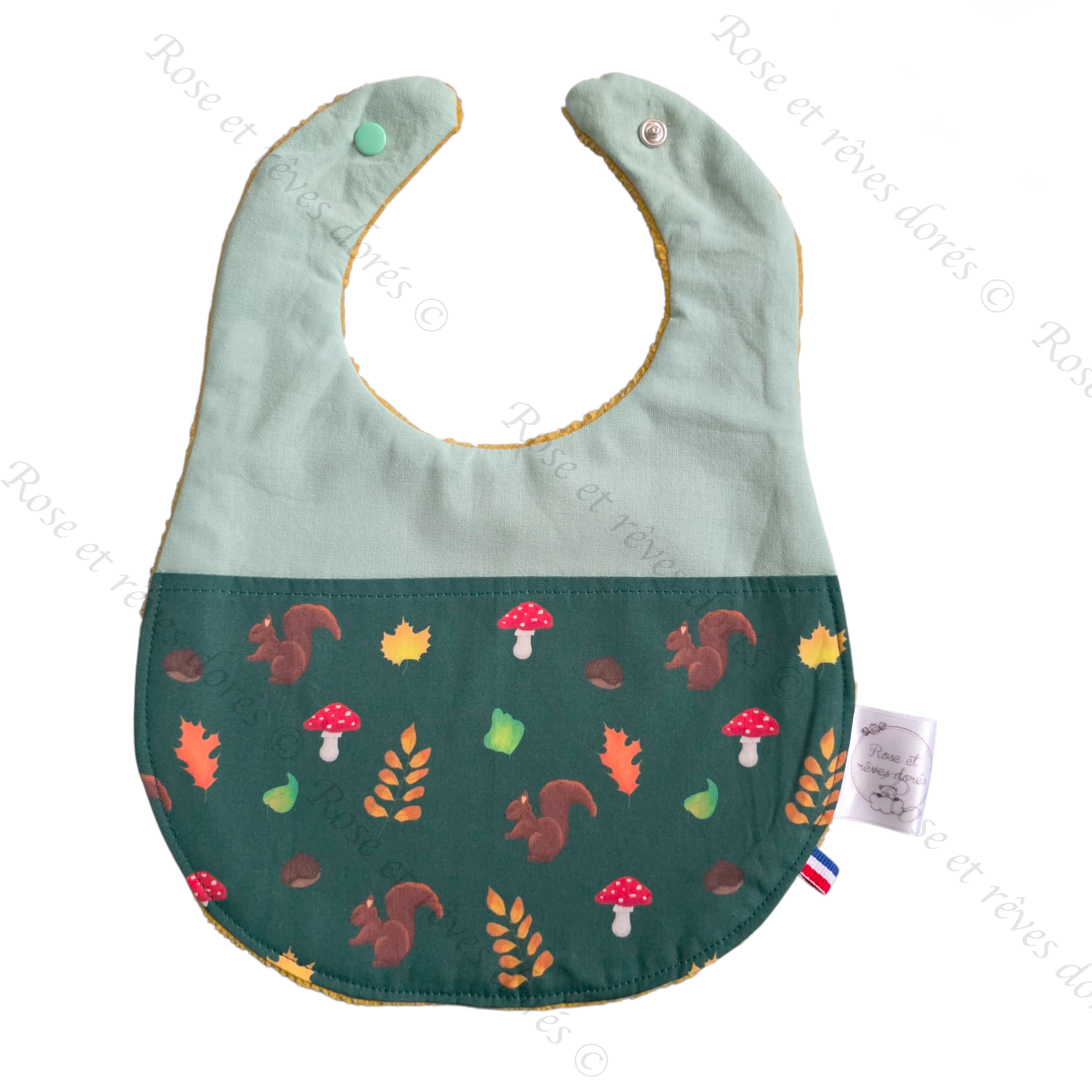 bavoir motif exclusif Rose et rêves dorés